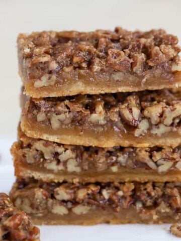 Maple Pecan Pie Bars on a white background