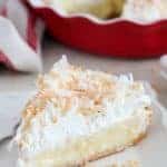 Coconut Cream Pie on a white plate.