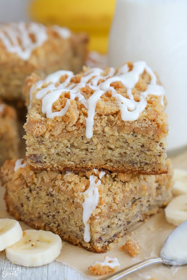 Two slices of banana cake stacked on top of each other.