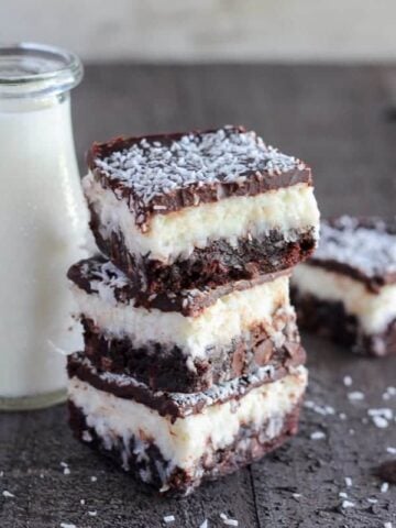 Stack of coconut brownies.