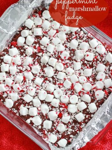 Baking dish of fudge topped with marshmallows and crushed candy canes.