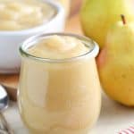 Pear sauce in a glass jar.