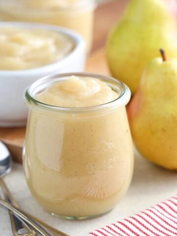 Pear sauce in a glass jar.