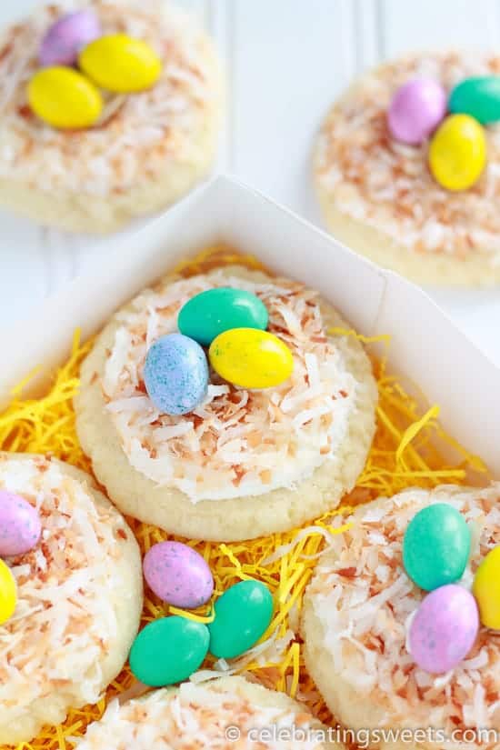 Sugar cookies topped with coconut and egg shaped candies. 