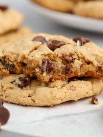 Two Peanut Butter Oatmeal Cookies with chocolate chips.