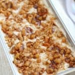 Apple pie ice cream in a metal loaf pan.