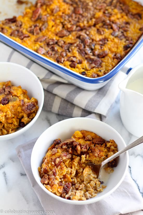 Pumpkin oatmeal in two white bowls.