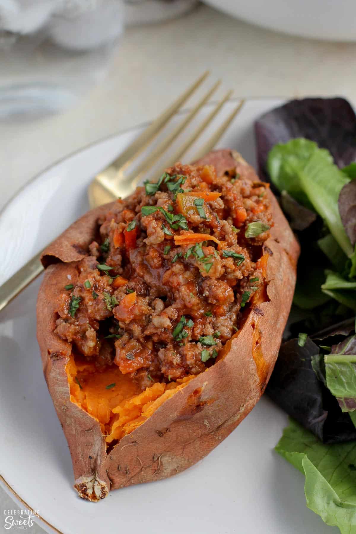 Baked sweet potato stuffed with sloppy joe meat