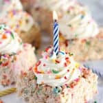 Rice krispies topped with sprinkles and frosting.
