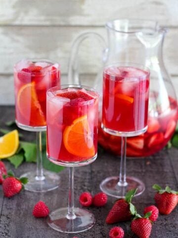 Three glasses of strawberry sangria.