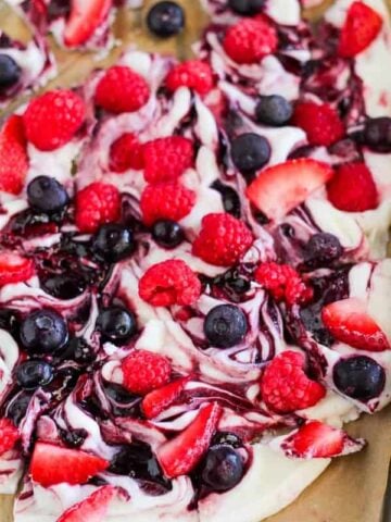 Frozen yogurt bark topped with berries.
