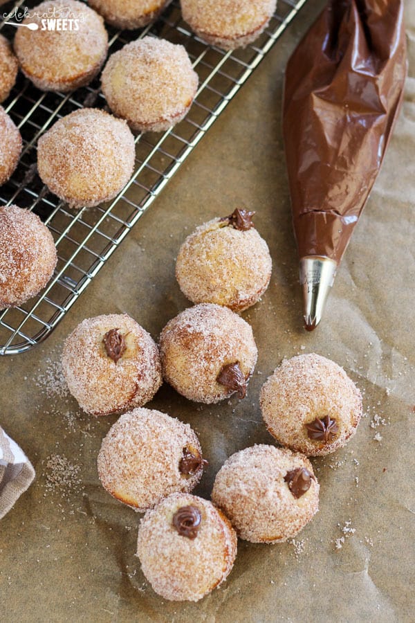 Donut holes filled with chocolate sauce coated in sugar.