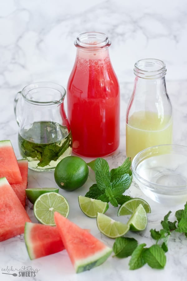 Ingredients for mojito: juice, simple syrup, limes.
