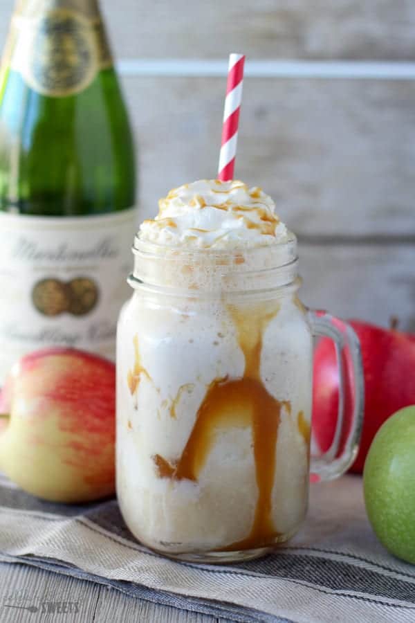 Apple cider float in a mason jar with caramel sauce.