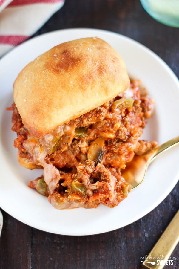 Pizza sloppy joe on a white plate.