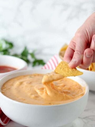 Queso dip and tortilla chips.