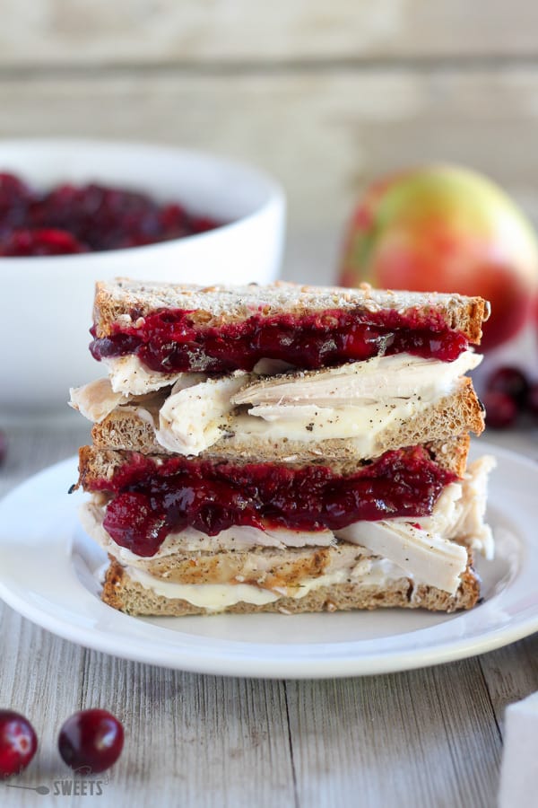 Turkey sandwich with cranberry sauce.