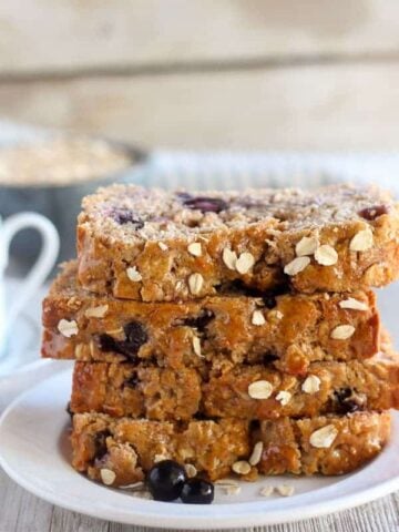 Stack of blueberry oatmeal bread.