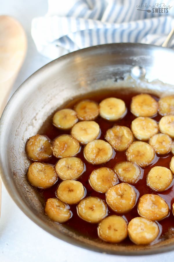 Bananas and brown sugar in a pan.