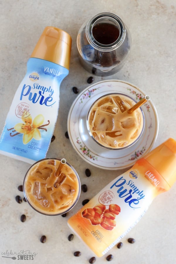 Cold brew coffee with two containers of creamer.