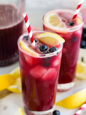 A close up of Blueberry Lemonade in a glass.