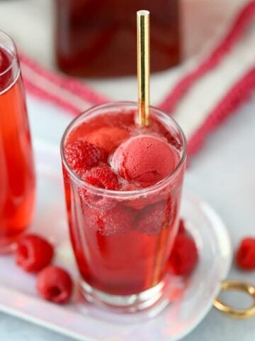 Champagne Cocktails with raspberries