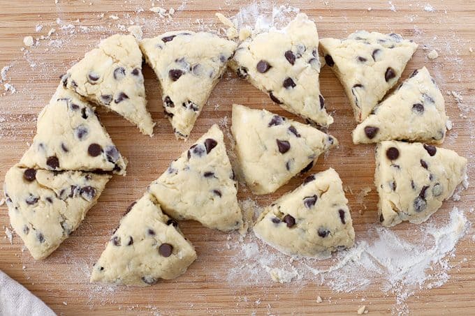 Chocolate Chip Scones on a wooden cutting board.