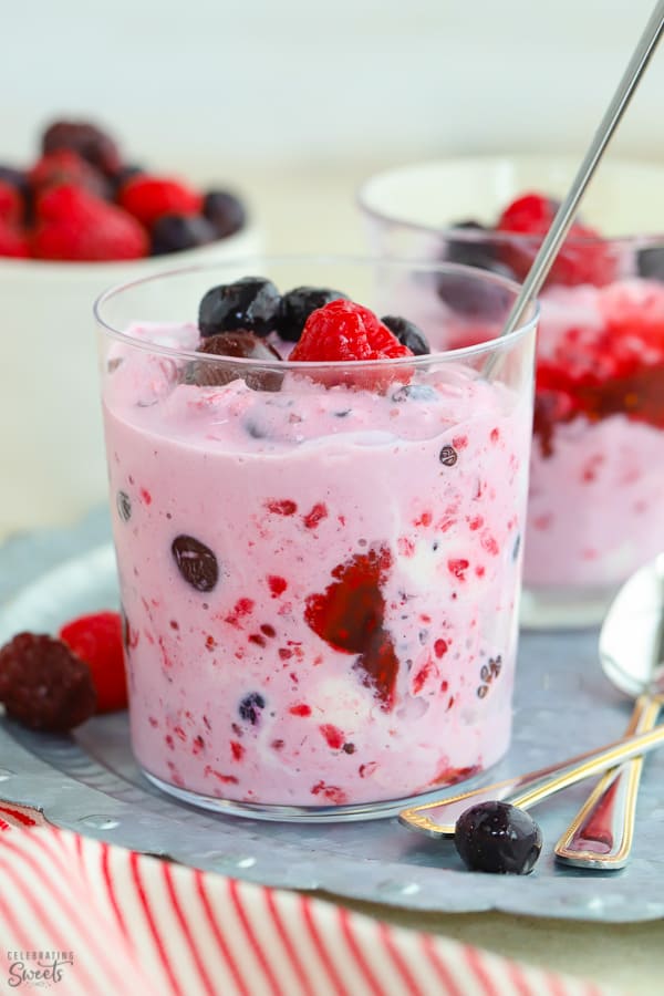 Berries mashed with ice cream in a glass.