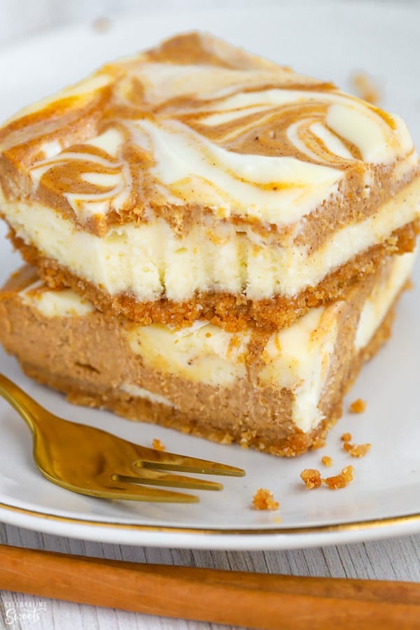 Stack of pumpkin cheesecake bars.