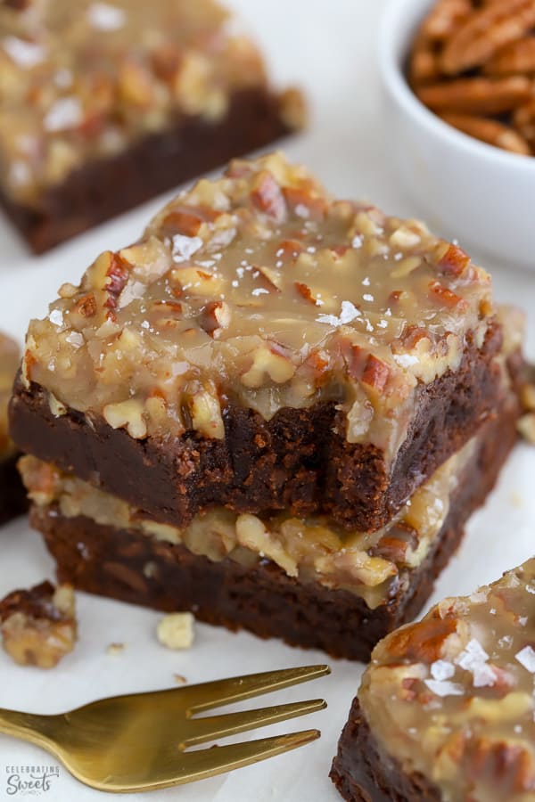 Stack of brownies with pecan topping