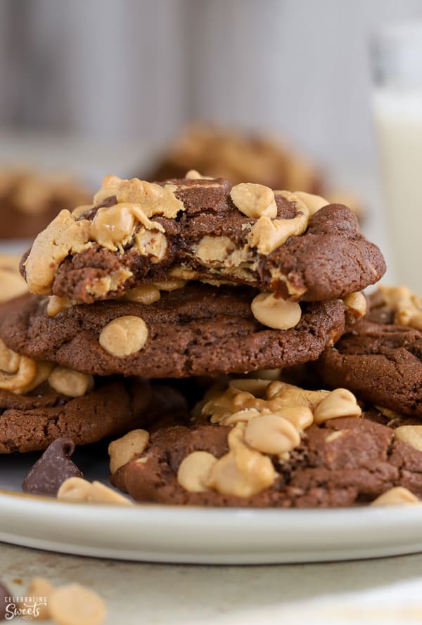 Plate of chocolate cookies topped with peanut butter chips