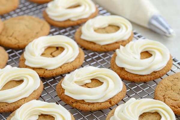 Graham cracker cookies with a swirl of white frosting.
