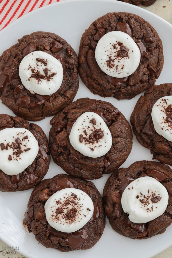 Plate of chocolate cookies topped with marshmallows