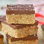 Stack of three cereal bars topped with chocolate