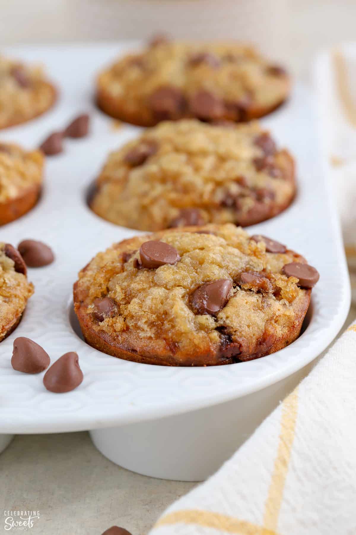 Banana Chocolate Chip Muffins in a white muffin pan