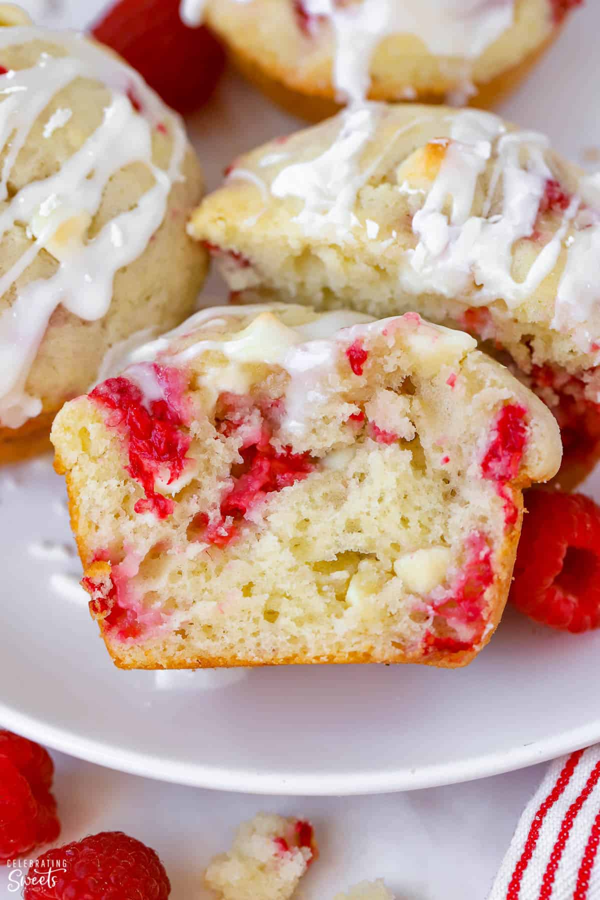 Closeup of a raspberry muffin cut in half.