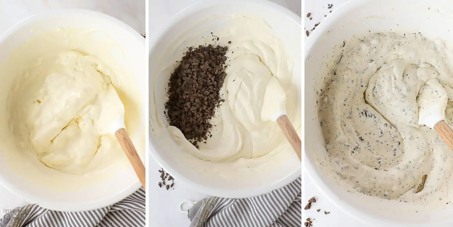 Mint chip ice cream base in a large white bowl with a white spatula.