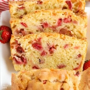 Slices of strawberry bread on a white plate.