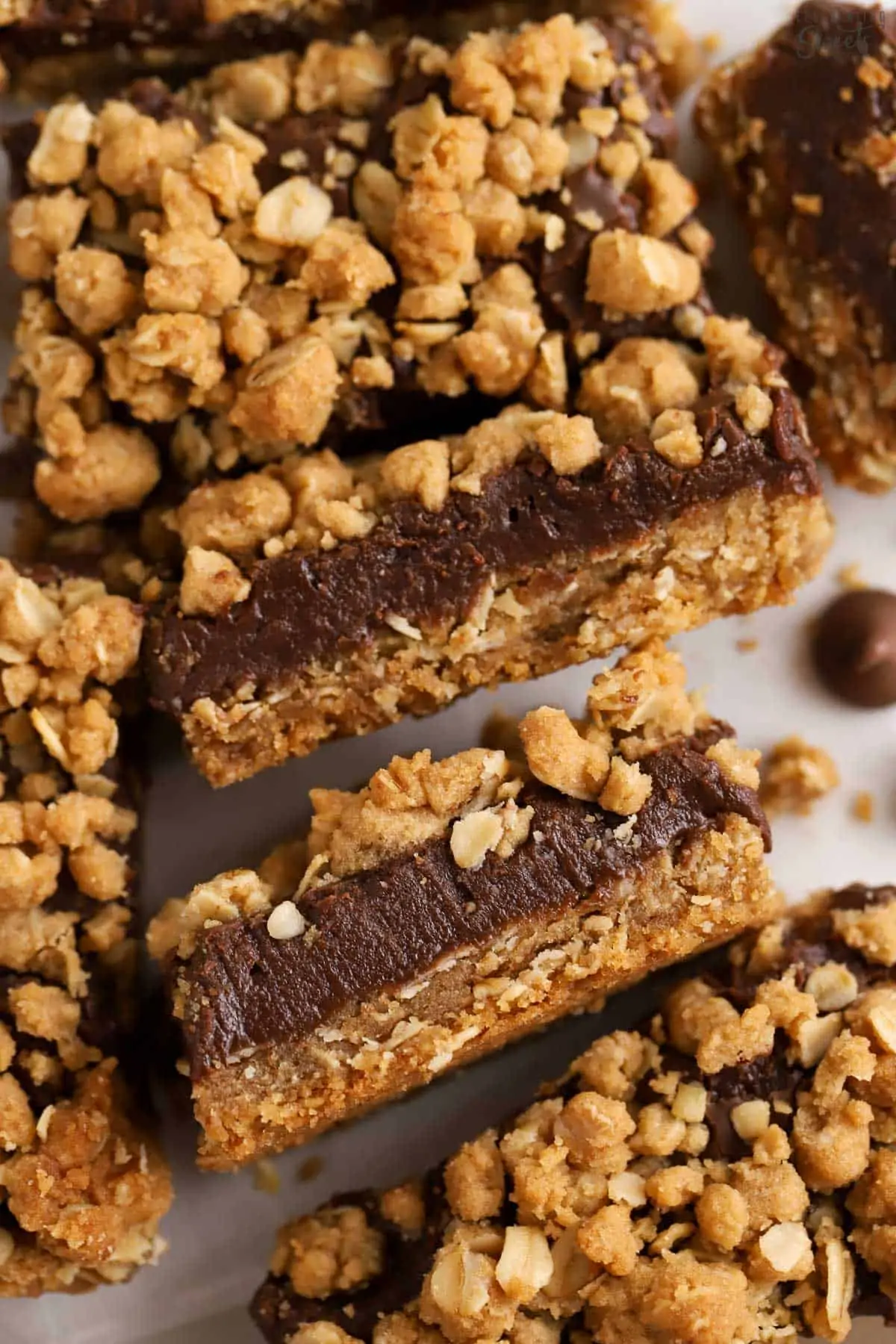 Oatmeal Fudge Bars on parchment paper.