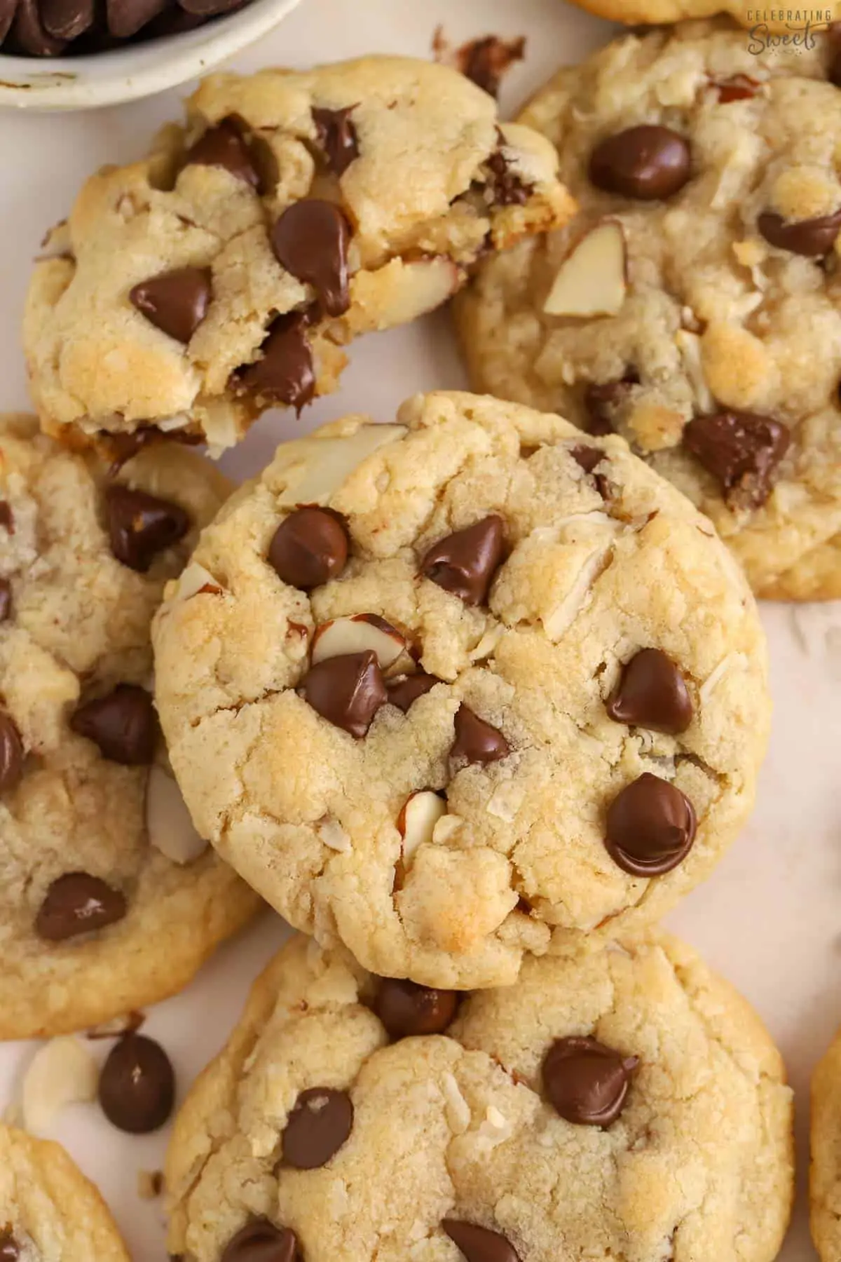 Almond joy cookies on parchment paper.