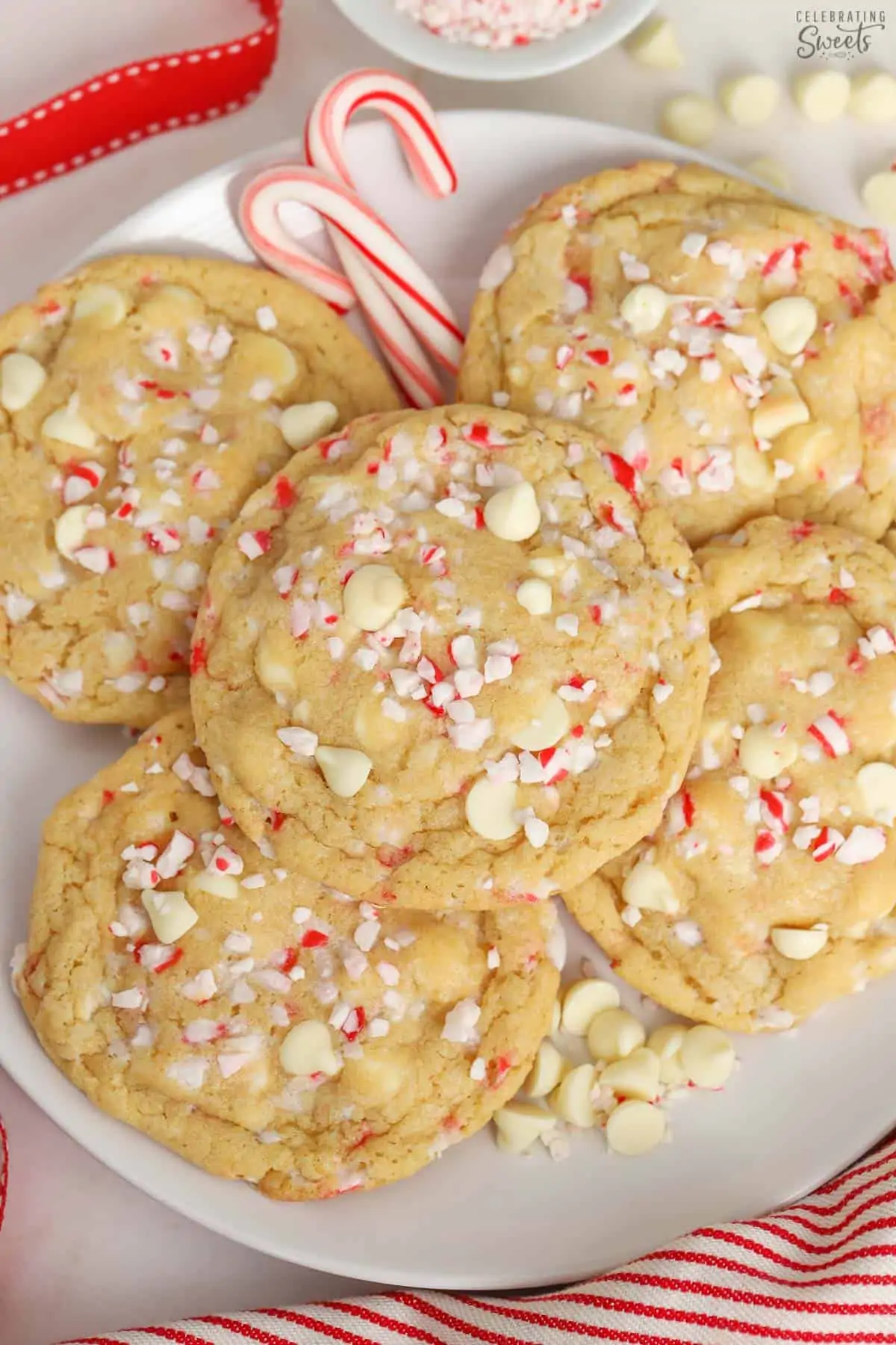 White plate topped with white chocolate peppermint cookies.
