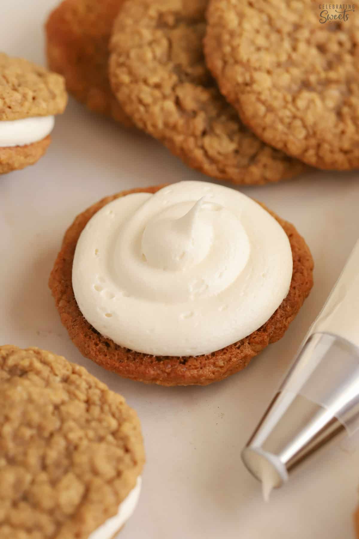 White frosting on an oatmeal cookie.