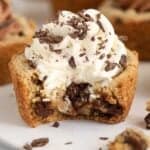 Cookie cup with a bite taken out of it.