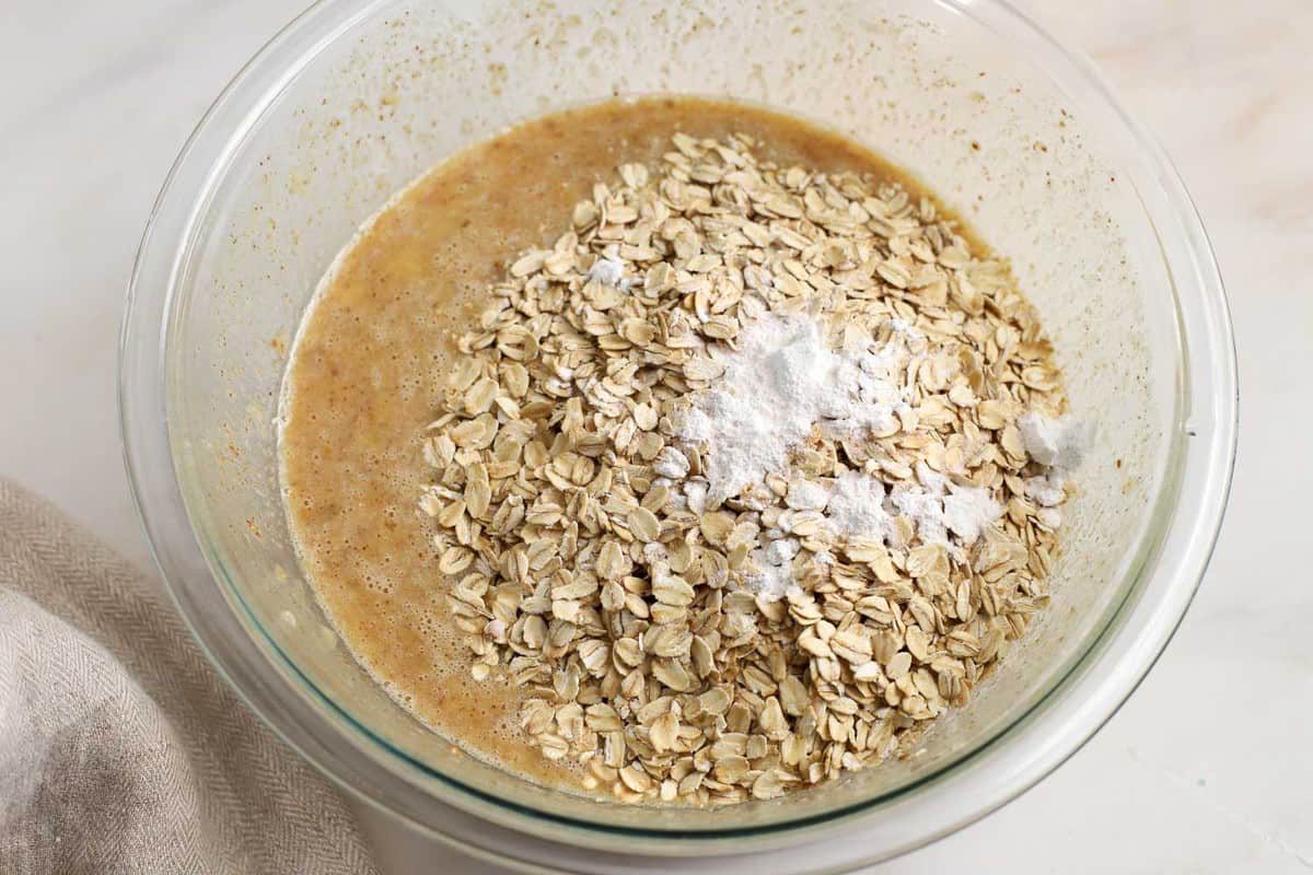 Baked oatmeal batter in a glass bowl.