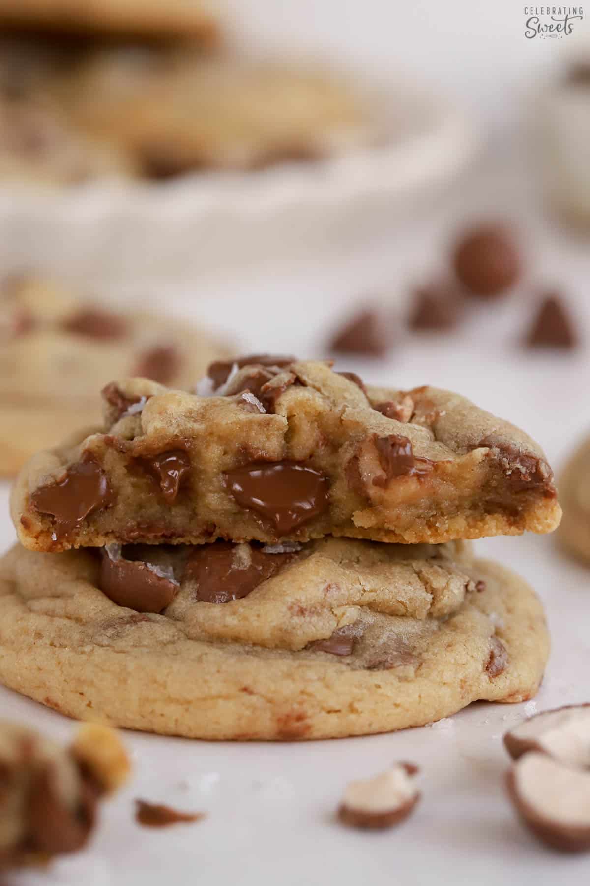 Stack of malted chocolate chip cookies with melty chocolate chips.