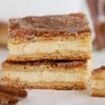Stack of two pieces of churro cheesecake
