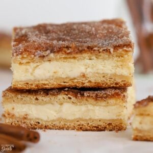 Stack of two pieces of churro cheesecake