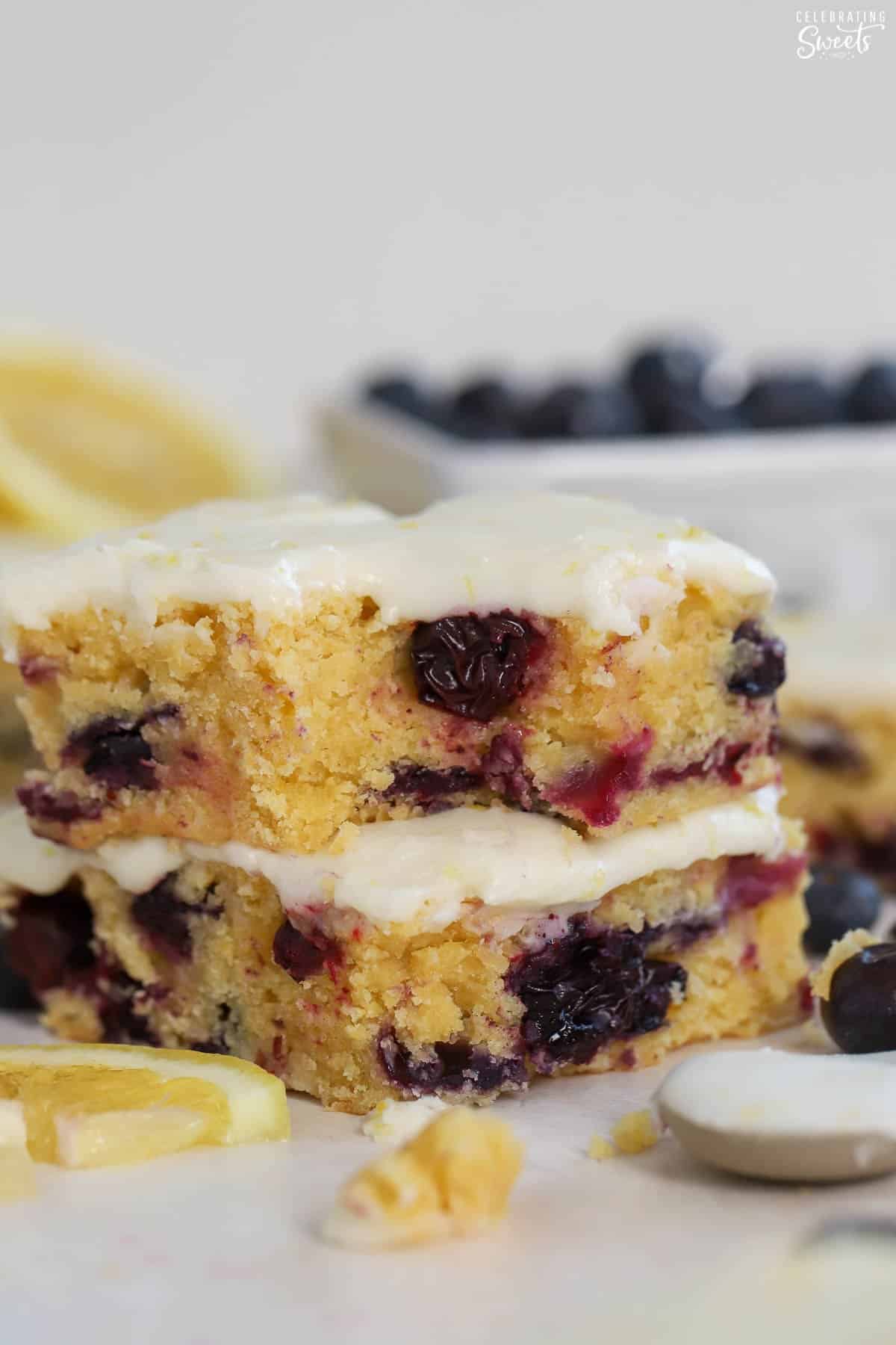 Stack of two lemon blueberry bars.