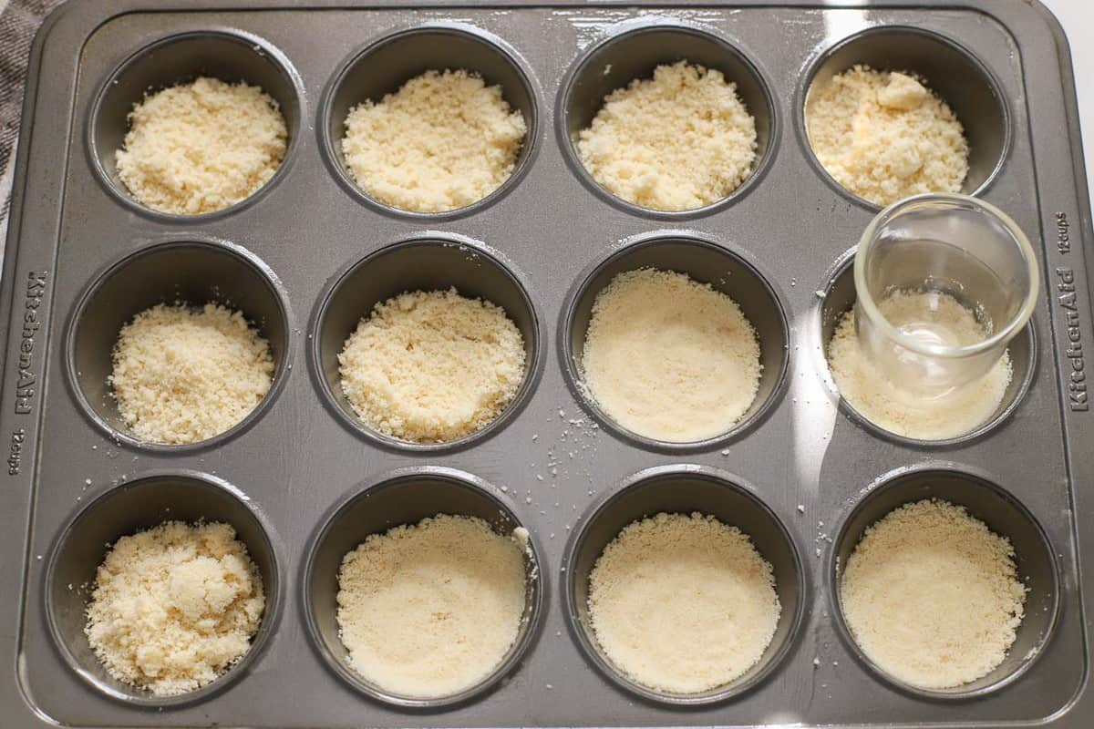 Crumb dough in a muffin pan.