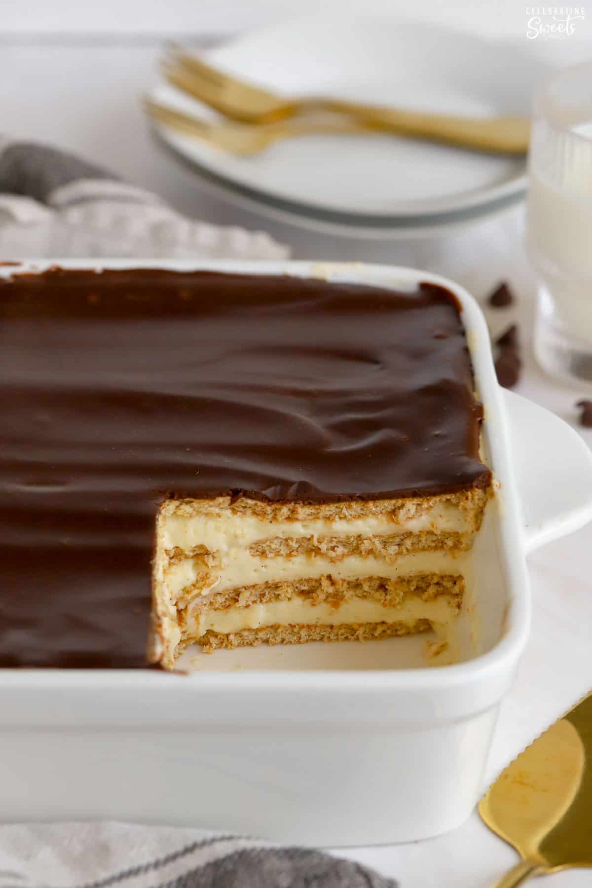 Eclair cake in a white baking dish.
